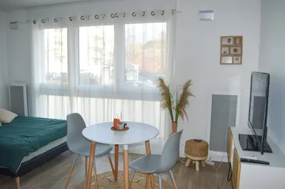 Coin salon dans l'établissement Logement neuf - cœur de ville