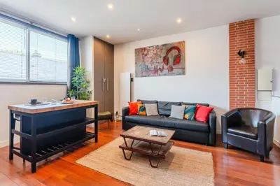 Coin salon dans l'établissement Loft Lamoricière - 15 minutes à pieds du centre