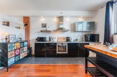 Cuisine ou kitchenette dans l'établissement Loft Lamoricière - 15 minutes à pieds du centre