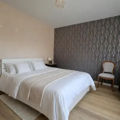Appartement confortable avec jardin privatif