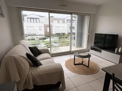 Télévision ou salle de divertissement dans l'établissement Résidence Villa Médicis - PORNICHET Appartement proche plage MAE-1023