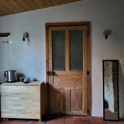 Cuisine ou kitchenette dans l'établissement La Petite Pièce