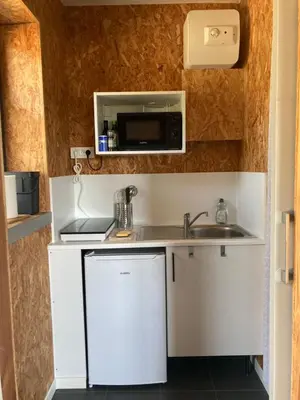 Cuisine ou kitchenette dans l'établissement Chambre calme et spacieuse pour amoureux de la nature
