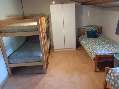 Un ou plusieurs lits dans un hébergement de l'établissement Le Gîte Vert