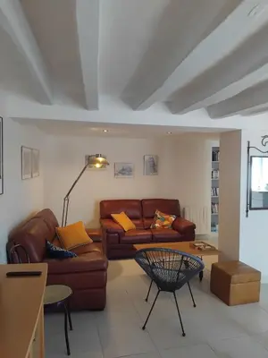 Coin salon dans l'établissement Grande maison 6 personnes proche Angers