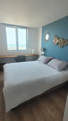 Un ou plusieurs lits dans un hébergement de l'établissement Oceandream vue sur l'ocean 6 personnes Nouveau !