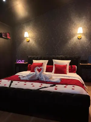 Un ou plusieurs lits dans un hébergement de l'établissement Le Love des monts