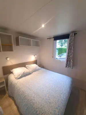 Un ou plusieurs lits dans un hébergement de l'établissement Bungalow, 3 chambres