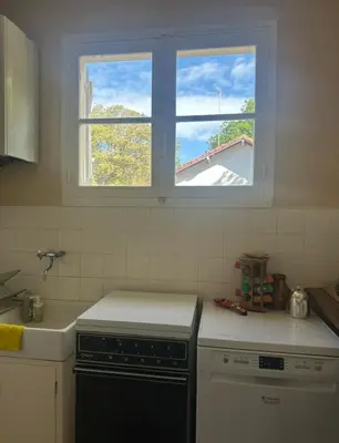 Cuisine ou kitchenette dans l'établissement Maison bord de plage