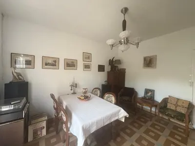 Télévision ou salle de divertissement dans l'établissement Maison bord de plage