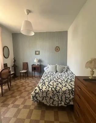 Un ou plusieurs lits dans un hébergement de l'établissement Maison bord de plage