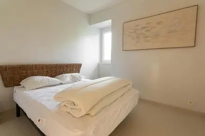 Un ou plusieurs lits dans un hébergement de l'établissement Appartement avec parking La Flocellière