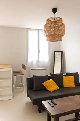 Coin salon dans l'établissement Appartement avec parking La Flocellière