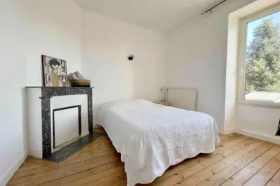 Un ou plusieurs lits dans un hébergement de l'établissement Maison Charmante - Centre de Ville - Proche gare