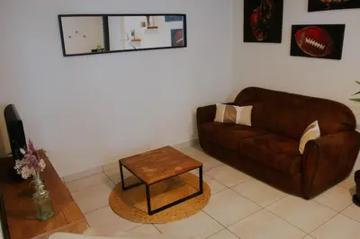 Coin salon dans l'établissement Cozy house with garden, comfort for 6 people