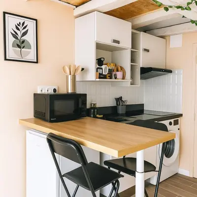 Cuisine ou kitchenette dans l'établissement Studio Cosy ambiance Tiny House