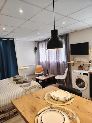 Coin salon dans l'établissement Le Petit Choletais