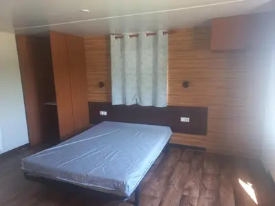 Un ou plusieurs lits dans un hébergement de l'établissement Cottage adapté PMR