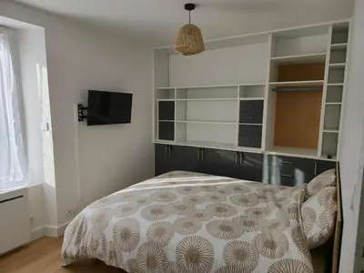 Un ou plusieurs lits dans un hébergement de l'établissement BrevAppart - Hyper Centre - 3 chambres - jusqu'à 6 pers
