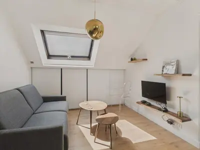 Télévision ou salle de divertissement dans l'établissement Vue mer - Appart pour 2 adultes et 1 enfant