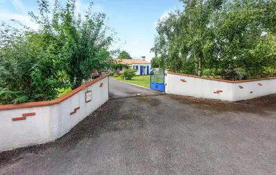 Jardin de l'établissement Charmante Maison En Vendée