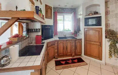 Cuisine ou kitchenette dans l'établissement Charmante Maison En Vendée
