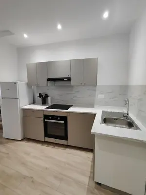 Cuisine ou kitchenette dans l'établissement Appartement Confort Cholet