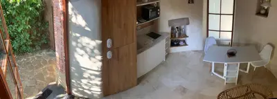 Télévision ou salle de divertissement dans l'établissement Vieux moulin à vent de 400 ans réhabilité