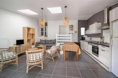 Cuisine ou kitchenette dans l'établissement Appart-patio Centre-ville à 100m de la plage