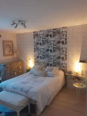 Un ou plusieurs lits dans un hébergement de l'établissement Maison pour 4 personnes au cœur du vignoble Nantais