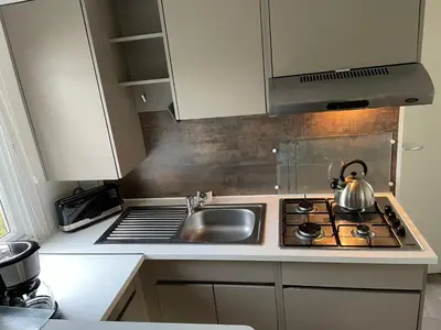 Cuisine ou kitchenette dans l'établissement Nouveau Vacance nature au calme