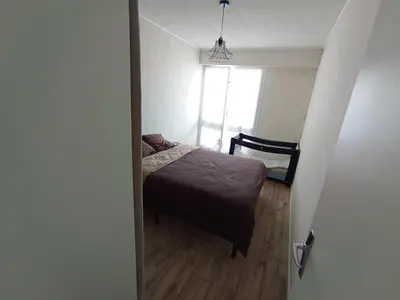 Un ou plusieurs lits dans un hébergement de l'établissement Appartement T2 vue mer, pieds dans l'eau