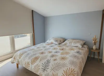 Un ou plusieurs lits dans un hébergement de l'établissement Grange Les Sens Ciel