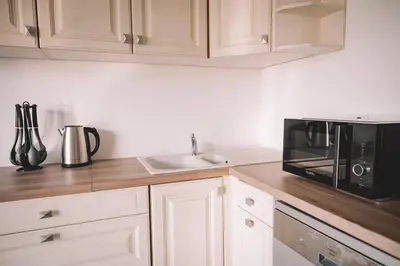 Cuisine ou kitchenette dans l'établissement Grange Les Sens Ciel