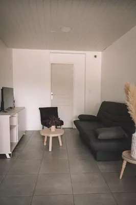Télévision ou salle de divertissement dans l'établissement Grange Les Sens Ciel