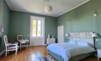 Un ou plusieurs lits dans un hébergement de l'établissement Grande maison de charme centre bourg