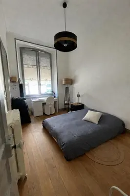 Un ou plusieurs lits dans un hébergement de l'établissement Gare - Visitation grand Appartement , 1 chambre
