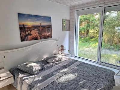 Un ou plusieurs lits dans un hébergement de l'établissement maison 4 chambres