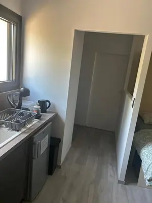 Cuisine ou kitchenette dans l'établissement Studio cosy et indépendant - idéal pour 2 personnes