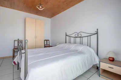 Un ou plusieurs lits dans un hébergement de l'établissement Maison pour 6 avec jardin à La Plaine sur Mer
