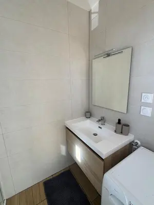 Un ou plusieurs lits dans un hébergement de l'établissement Chaleureux studio central Appart B