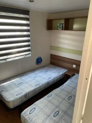 Un ou plusieurs lits dans un hébergement de l'établissement Camping 4 Étoiles Mobilhome Chez Jéjé et Fredo