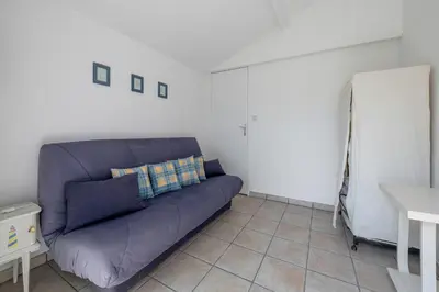 Coin salon dans l'établissement 600 m de la plage, maison pour 4 adultes 2 enfants
