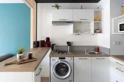 Cuisine ou kitchenette dans l'établissement Le Marnier - Moderne & Central