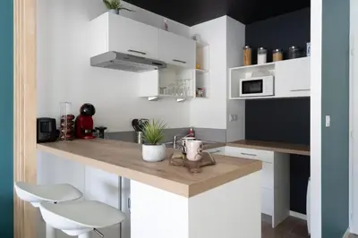 Cuisine ou kitchenette dans l'établissement Le Marnier - Moderne & Central