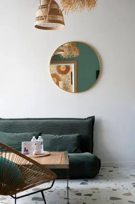 Coin salon dans l'établissement L'Ogive - Charmant appartement au coeur de Clisson