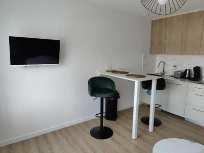 Cuisine ou kitchenette dans l'établissement Appartement proche plage et centre-ville