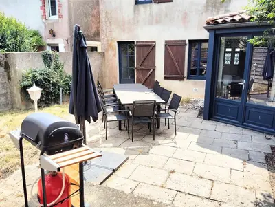 Terrasse ou espace extérieur de l'établissement Gîte de l'Église de la Pommeraie