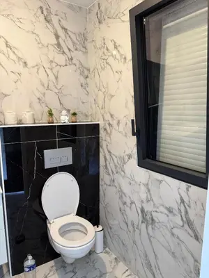 Salle de bains dans l'établissement Maison La Pornicaise 11