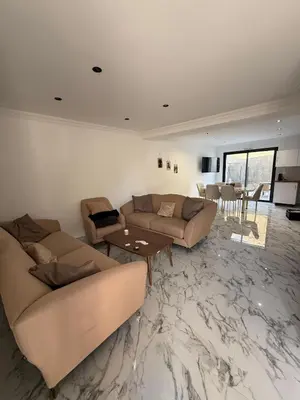 Coin salon dans l'établissement Maison La Pornicaise 11